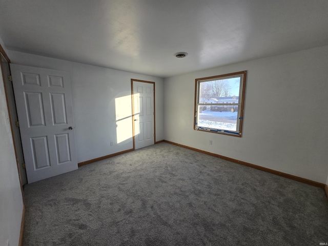 spare room with carpet flooring