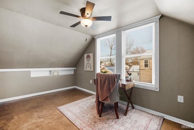 home office featuring ceiling fan and vaulted ceiling