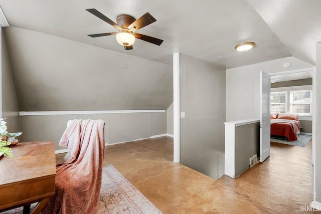 office featuring ceiling fan and lofted ceiling