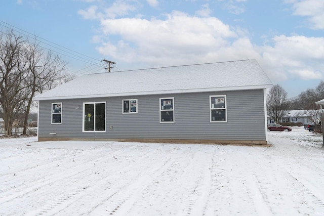 view of snow covered property