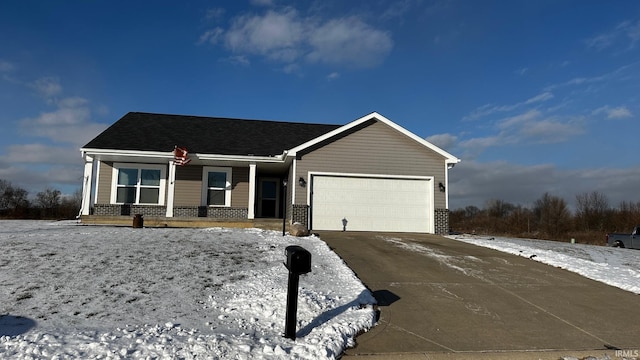 view of front facade with a porch and a garage