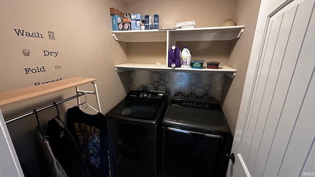 washroom featuring independent washer and dryer