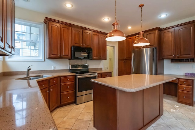 kitchen featuring stainless steel appliances, sink, light tile patterned floors, hanging light fixtures, and light stone countertops