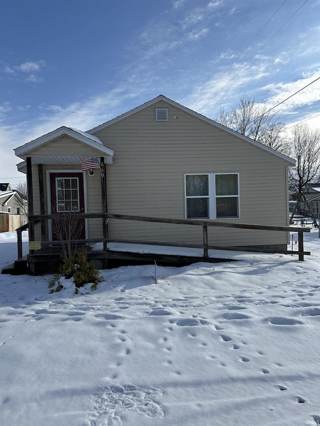 view of snow covered property