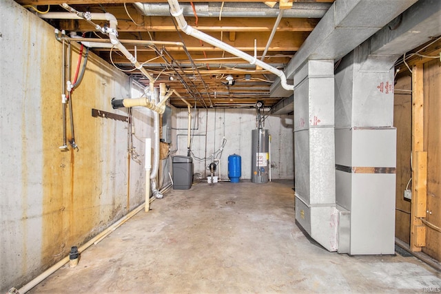 basement featuring heating unit and gas water heater