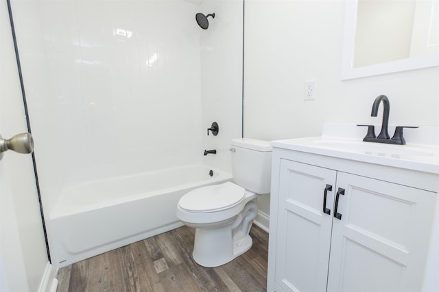 full bathroom with shower / bathing tub combination, wood-type flooring, vanity, and toilet