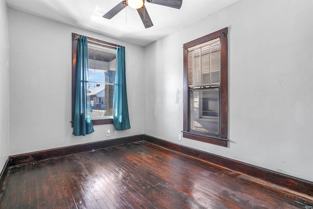 empty room featuring ceiling fan and wood-type flooring