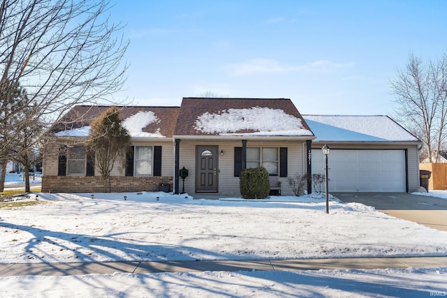 single story home with a garage