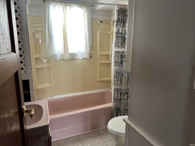 bathroom with tile patterned flooring, shower / bath combination with curtain, and toilet