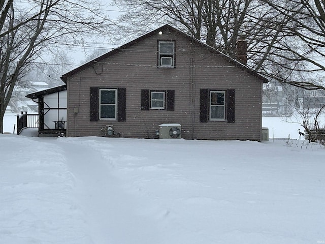 view of snow covered house