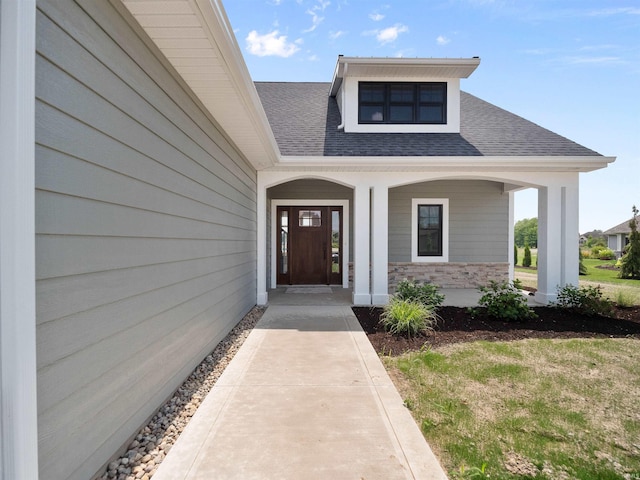 entrance to property with a porch