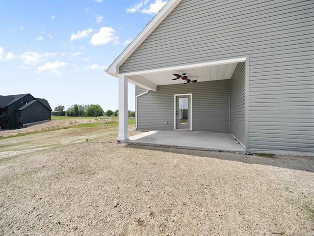 view of patio / terrace featuring ceiling fan