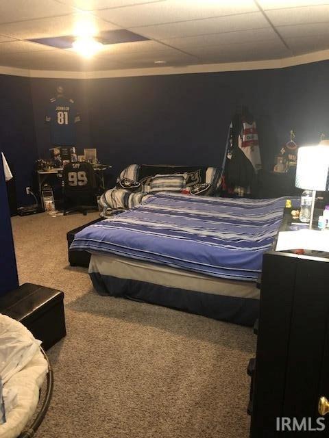 2893 S US Route 31, Peru, IN 46970 - carpeted bedroom with ceiling fan