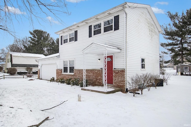 view of front of property featuring a garage