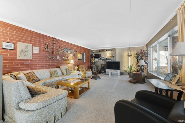 carpeted living room featuring crown molding and brick wall