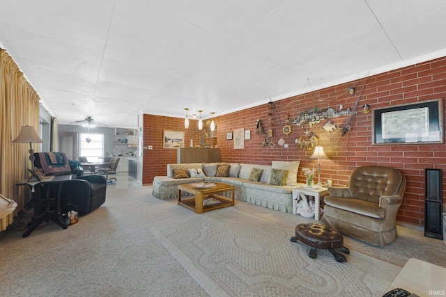 living room with ceiling fan and brick wall