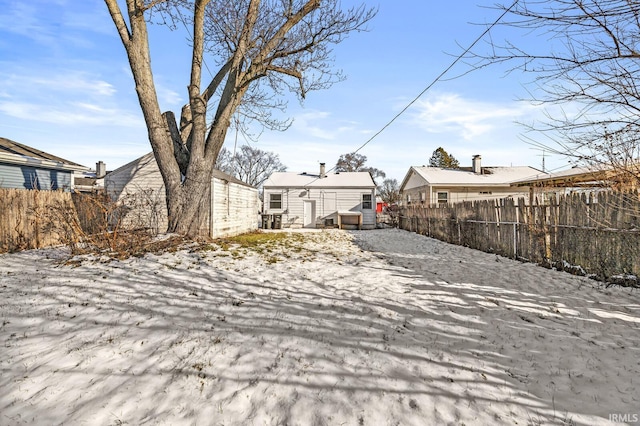 view of yard covered in snow