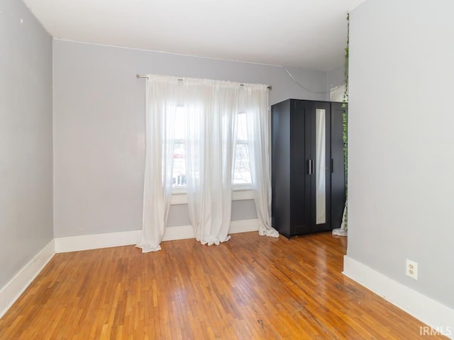 empty room featuring hardwood / wood-style floors