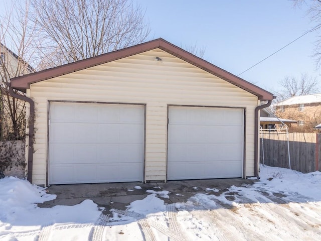 view of snow covered garage