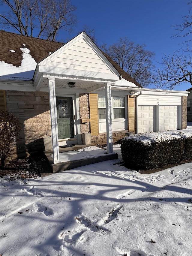 view of front of home featuring a garage