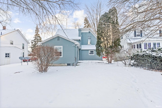 view of snow covered property