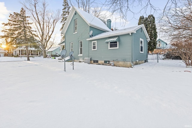 view of snow covered property