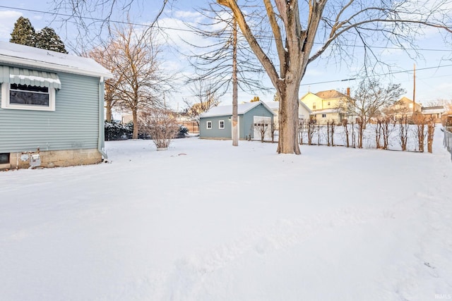 view of yard covered in snow