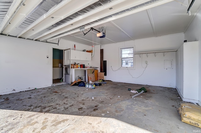 garage featuring a garage door opener