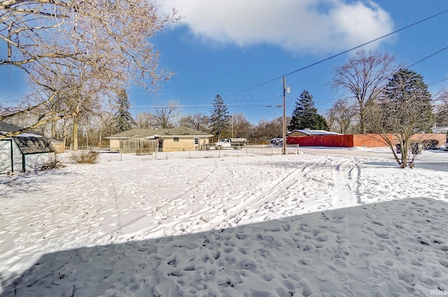 view of yard covered in snow