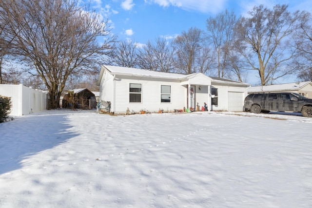 view of front of property featuring a carport