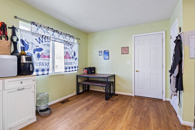 miscellaneous room featuring light wood-type flooring