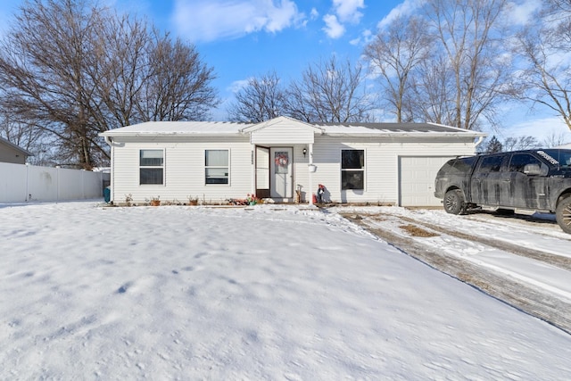 ranch-style home with a garage