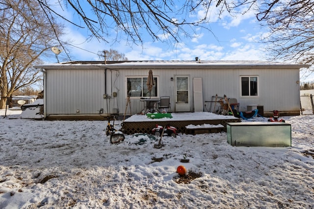 view of snow covered house