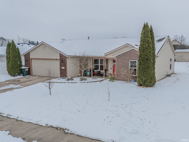 single story home featuring a garage