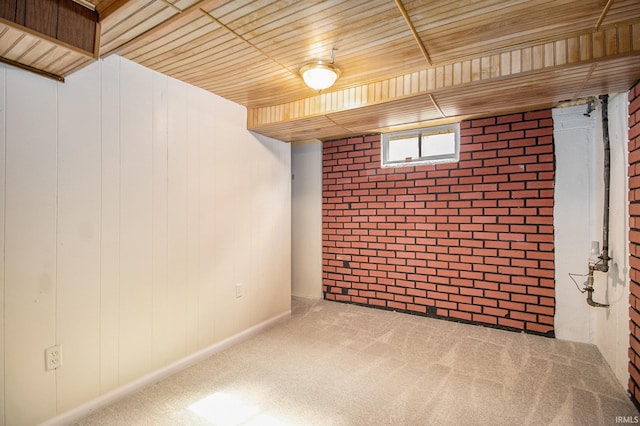 basement with wooden ceiling and carpet floors