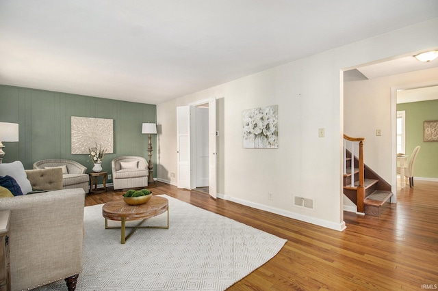 living room with wood-type flooring