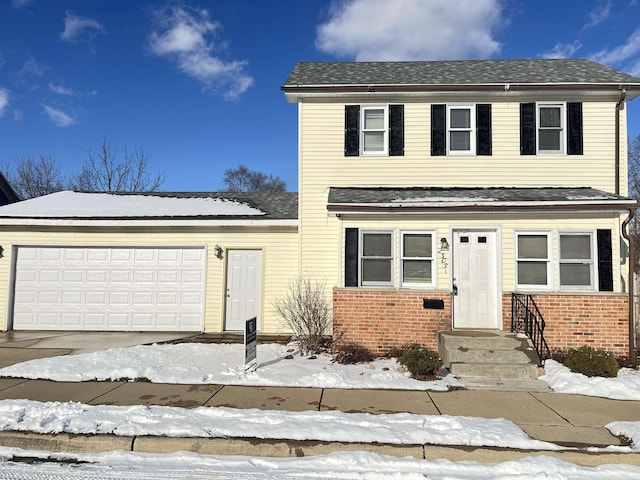 front of property featuring a garage