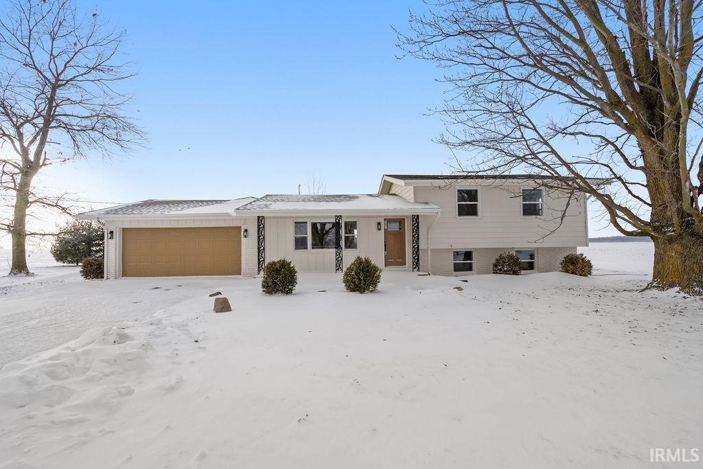 split level home featuring a garage