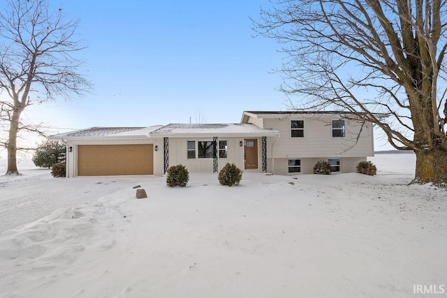 split level home featuring a garage