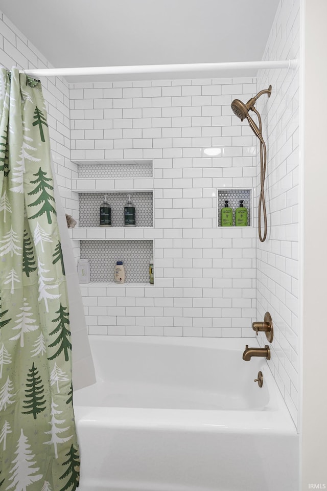 bathroom featuring shower / tub combo with curtain