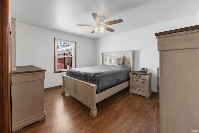 bedroom featuring ceiling fan and dark wood-type flooring