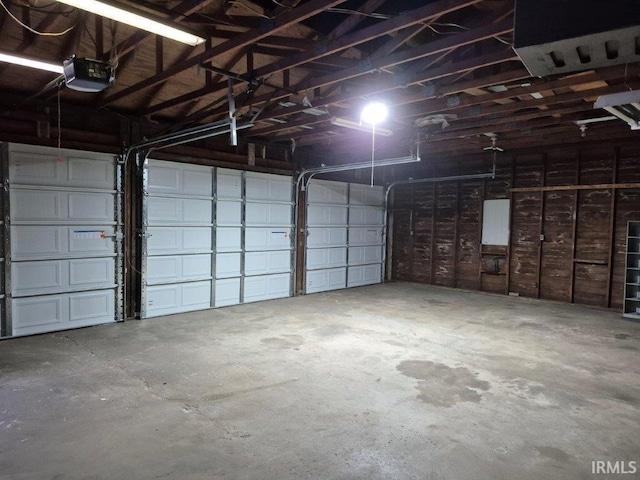 garage featuring a garage door opener