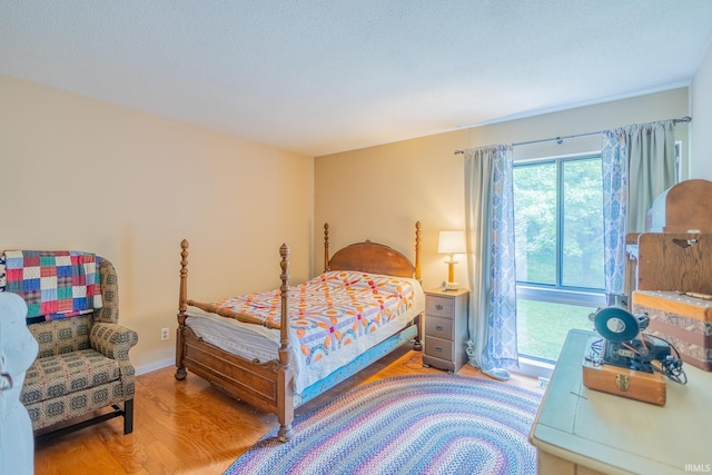 bedroom featuring hardwood / wood-style flooring