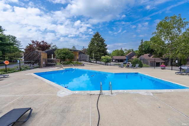 view of pool featuring a patio