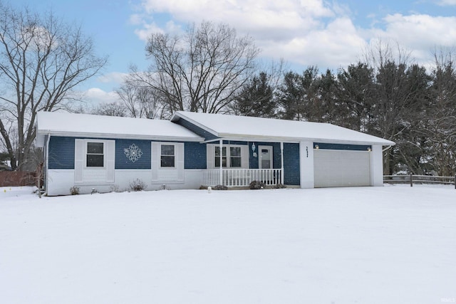 ranch-style house featuring a garage