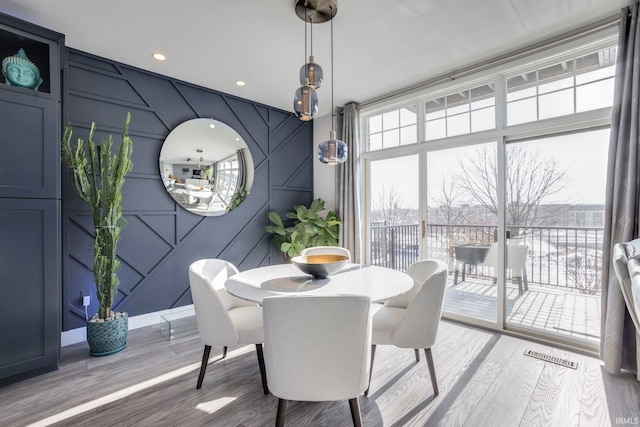 dining area featuring hardwood / wood-style flooring