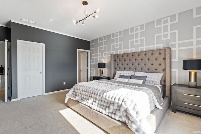 bedroom with light colored carpet and a chandelier