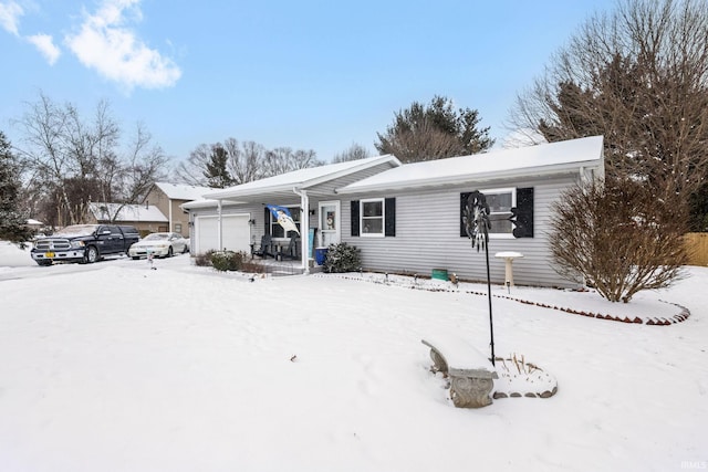 single story home featuring a garage