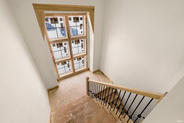 stairs with wood-type flooring