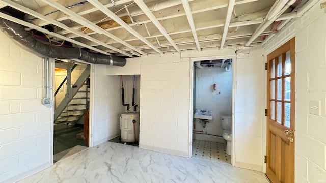 basement with sink and electric water heater